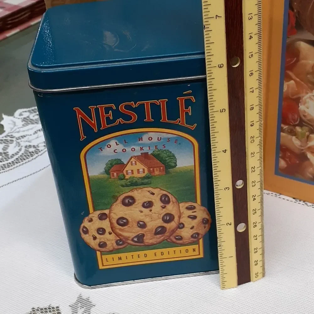 3-pc. Nestle's chocolate bundle: 2 vintage‎ tins and a hardcover cookbook